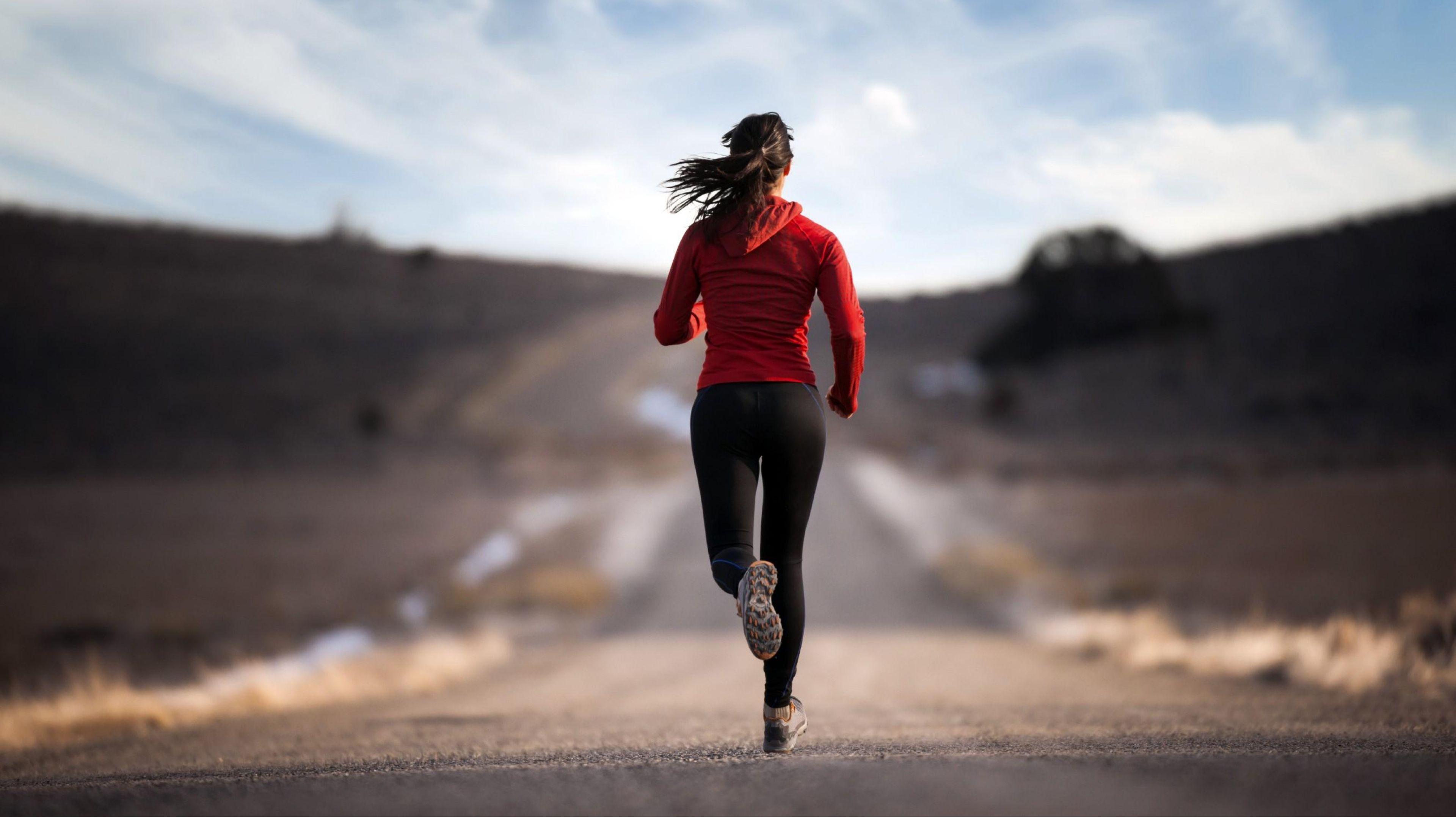 Person running on a road